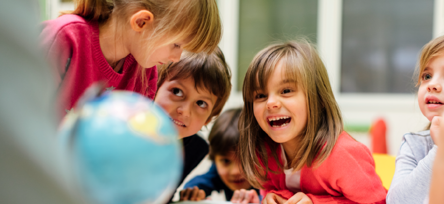Happy children in a classroom Happy children in a classroom